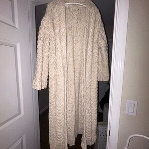 Hand knitted wool trench coat